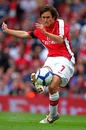 Tomas Rosicky of Arsenal passes the ball during the Emirates Cup match with Atletico Madrid