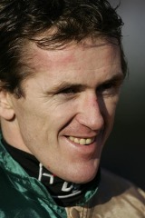 Tony McCoy is shown after winning the 2009 Racing Post Chase on Nacarat,