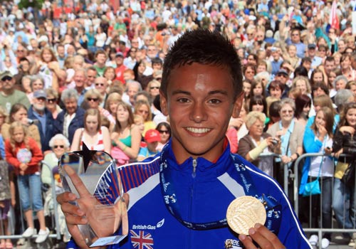 Tom Daley in home city of Plymouth during a homecoming parade to celebrate the 15-year-old winning a gold medal at the World Diving Championship