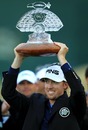 Hunter Mahan celebrates with his new trophy