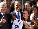 President Barack Obama poses for a group picture with the Texas A&M University women's basketball team