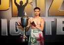 Usman Ahmed holds the Prizefighter trophy