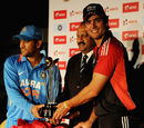 MS Dhoni and Alastair Cook smile with the series trophy