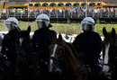 Mounted police separate fans