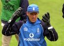 Alec Stewart throws his hands in the air
