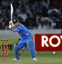 MS Dhoni goes for a big hit