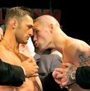 Tony Bellew drives his head towards Nathan Cleverly