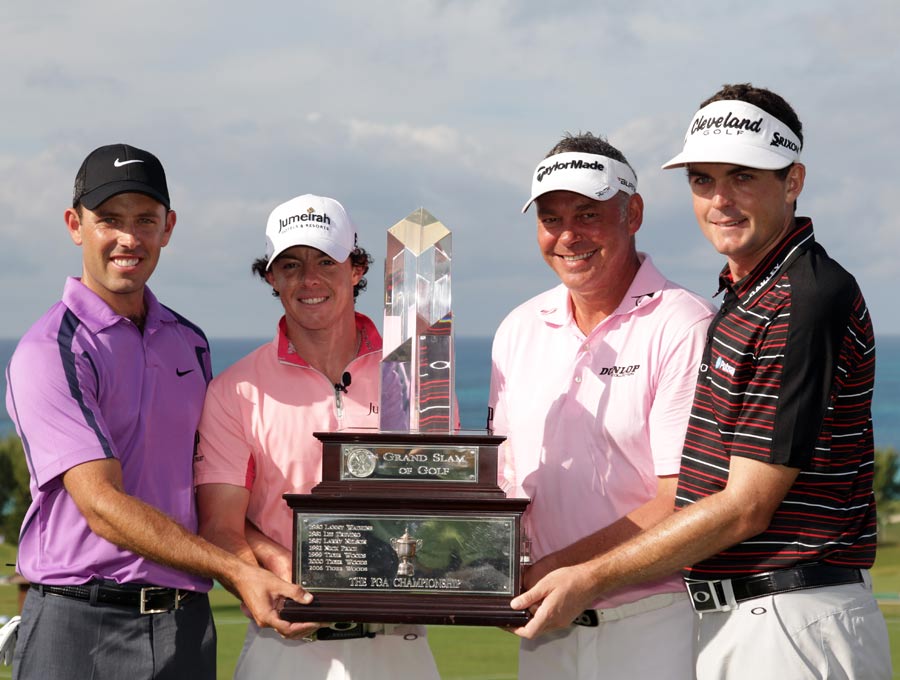Charl Schwartzel, Rory McIlroy, Darren Clarke and Keegan Bradley hold the PGA Grand Slam of Golf trophy