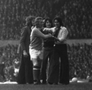 Denis Law is mobbed by Manchester United fans