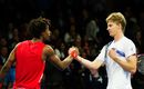 Gael Monfils shakes hands with Kevin Anderson