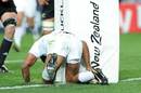 France skipper Thierry Dusautoir crashes over to score