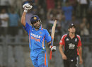 Virat Kohli punches the air after India seal victory