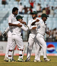 Shahadat Hossain celebrates a wicket with his team-mates