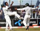 Elias Sunny celebrates his maiden Test wicket