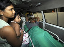 Thilan Samaraweera with his wife and daughter in the ambulance after reaching Colombo