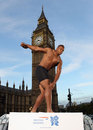 Lawrence Okoye poses outside the Houses of Parliament