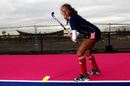 Kerry Williams poses at the unveiling of the Olympic Hockey Centre pitch