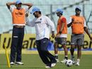 Mahendra Singh Dhoni celebrates after scoring a goal during a game of football in a training session