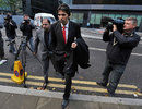 Mohammad Asif arrives at court as the jury continue their deliberations