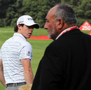 Rory McIlroy glances over his shoulder in the direction of Andrew Chubby Chandler