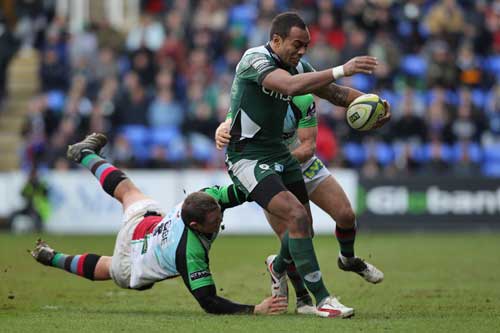London Irish's Sailosi Tagicakibau is held by the Quins defence