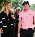 Rory McIlroy walks with Caroline Wozniacki