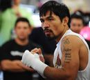 Manny Pacquiao prepares to strike