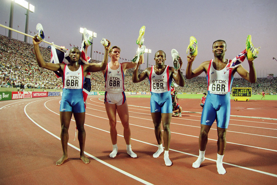 Derek Redmond, Roger Black, John Regis, and Kriss Akabusi celebrate winning gold