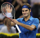 Roger Federer celebrates a comfortable victory