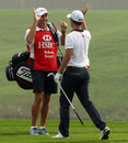 Steve Williams celebrates with Adam Scott after his eagle