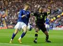 Leicester City's Paul Gallagher and Leeds United's Patrick Kisnorbo battle for the ball