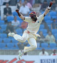 Footloose: Darren Sammy lets it rip after the fall of Rahul Dravid