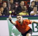 Stanislas Wawrinka lunges for the ball