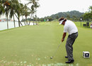 Phil Mickelson hits a tee shot during practice