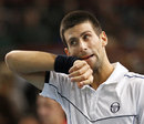 Novak Djokovic wipes his cheek
