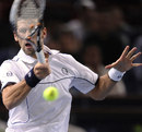 Novak Djokovic leans into a forehand