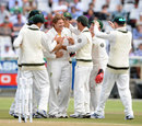Australia get together after a wicket