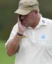 John Daly misses a shot on the first hole
