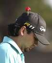 Jason Day wears a Remembrance Day poppy on his cap