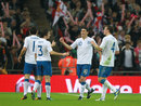 Gareth Barry is congratulated by his team-mates