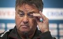 Guus Hiddink attends a news conference