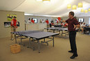 Lleyton Hewitt plays table tennis with Matt Kuchar