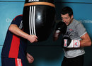 Carl Froch pounds the bag