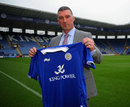 Nigel Pearson poses with a Leicester shirt after being confirmed as their new manager