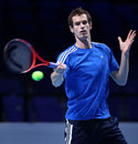 Andy Murray hits a ball during a practice session