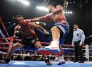 Manny Pacquiao lands a straight right on Juan Manuel Marquez
