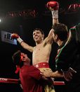 Julio Chavez Jnr is lifted up by his corner after stopping Peter Manredo Jnr