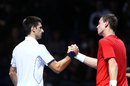 Novak Djokovic is congratulated by Tomas Berdych