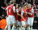 Arsenal congratulate Robin van Persie after his second goal