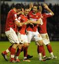 Alex Nicholls is congratulated after putting Walsall ahead